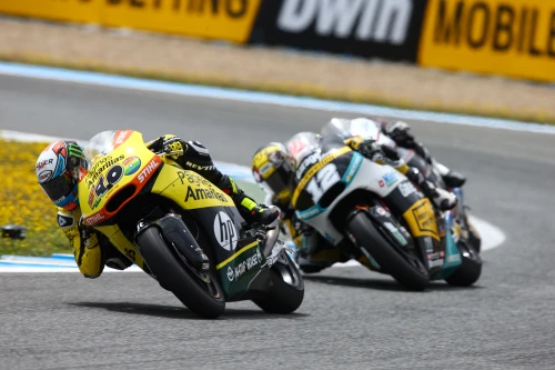 Rins goes to the ground in the fight for second place in Jerez